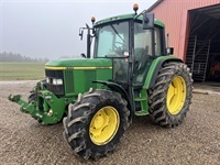 John Deere 6310 Med frontlift - Traktorer - Traktorer 4 wd - 2